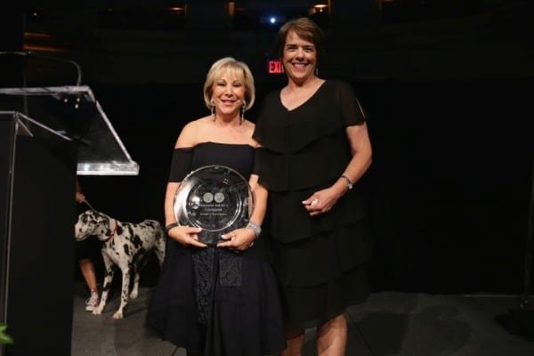 NEW YORK, NY - JUNE 09: Honoree/London Jewelers President Candy Udell and President/CEO of Bideawee Nancy Taylor speak onstage during the Bideawee Masquerade Ball at Gotham Hall on June 9, 2014 in New York City. (Photo by Neilson Barnard/Getty Images for Bideawee)